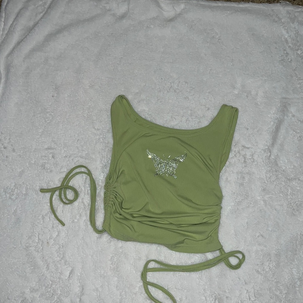 cute crop top with a butterfly in the middle